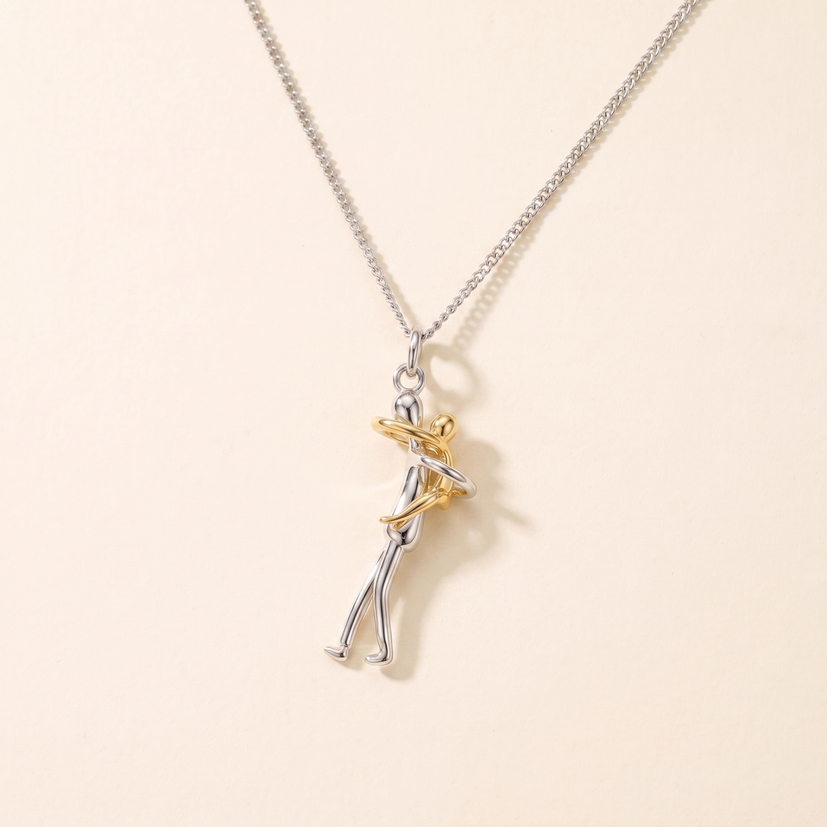 Hugging Figures Pendant Necklace — Embrace