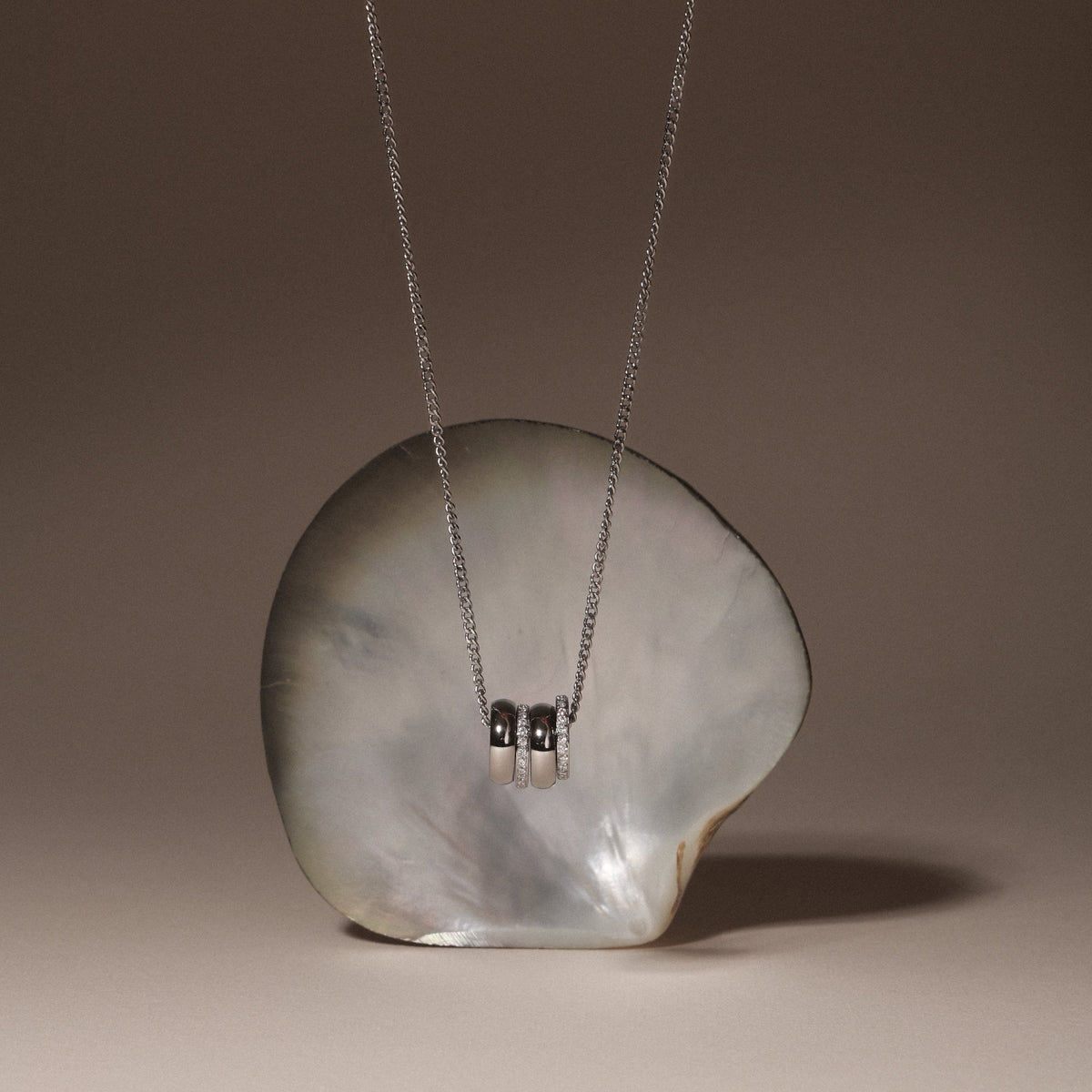 Triple Ring Zircon Necklace — Monte Carlo